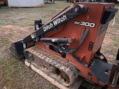 orange mini skid steer|mini skid steer track loader.